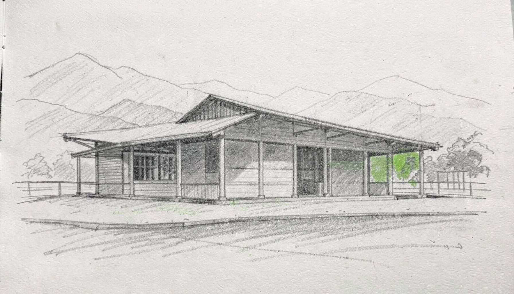 A graphite pencil sketch of a cricket ground pavilion with mountains faintly visible in the background, drawn with loose, expressive strokes.